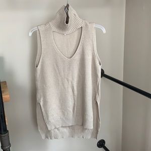 BCBGeneration Sleeveless turtle neck sweater with cut out
